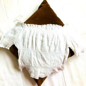 Blouse with bare shoulders